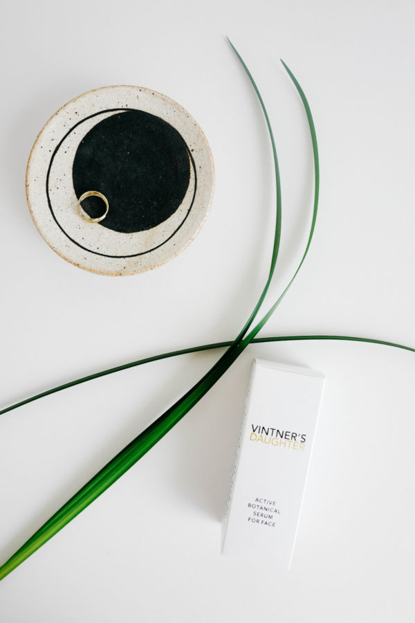 Lifestyle blogger Erin Hiemstra of Apartment 34 sharing her review of Vintner's Daughter Face oil, a insider's skincare secret