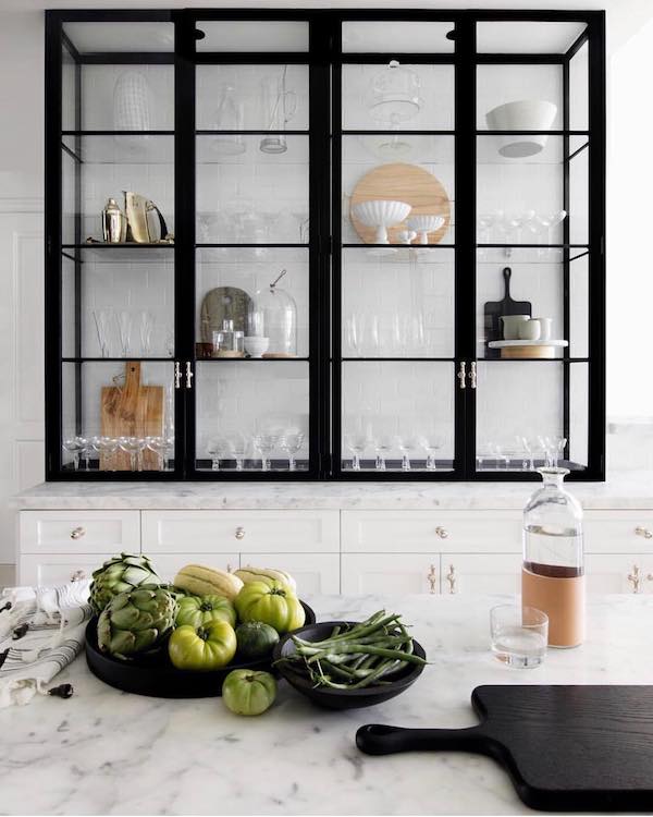 idea to steal: enclosed glass shelving on apartment 34